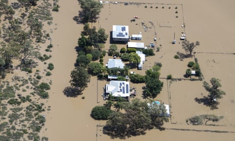 An aerial view of a flooded rural property