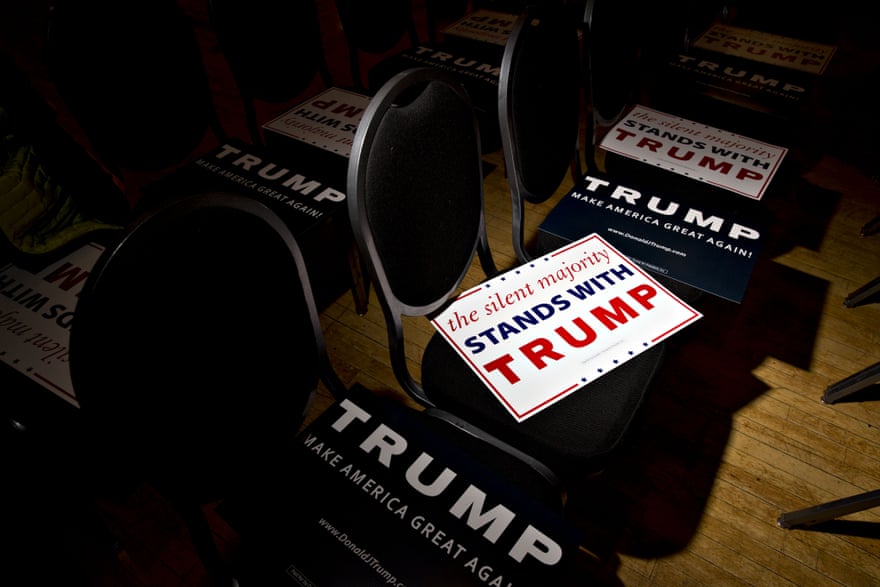 Campaign signs sit on chairs ahead of an event with Donald Trump in Racine, Wisconsin.
