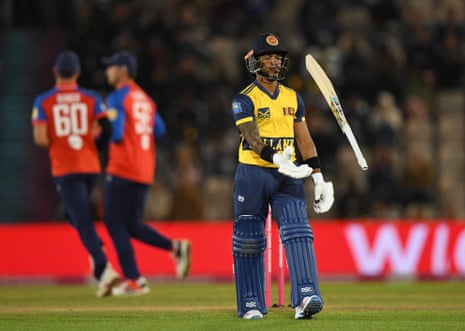 Pathum Nissanka of Sri Lanka throws his bat after being dismissed.