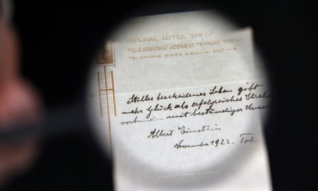A note written on a Tokyo hotel official paper in 1922 by Albert Einstein is seen before it is sold at an auction in Jerusalem.