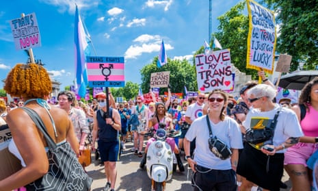 People take part in a Trans Pride in London in July 2022.