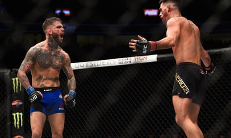 Cody Garbrandt and Dominick Cruz taunt each other.