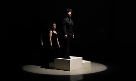 Two women on black stage