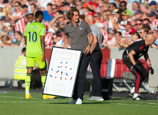 Brentford coach Thomas Frank with his tactics board during their match against Manchester United earlier this season.