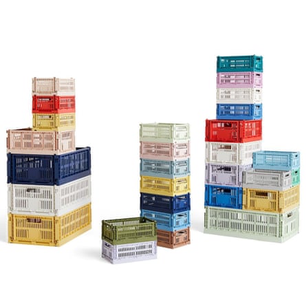 Four stacks of differently coloured HAY storage crates.