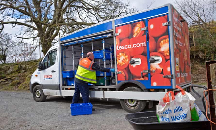Tesco supermarket food grocery delivery in plastic bags to a customer's home