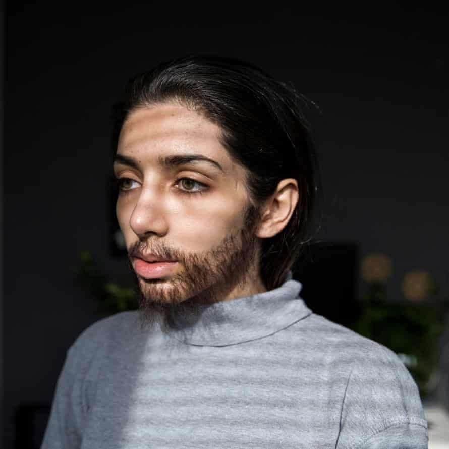 Zeinab uses makeup to disguise herself as a man.