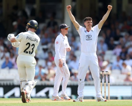 Matt Fisher of England celebrates taking the wicket of Glenn Phillips of New Zealand.