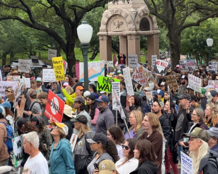 Protesters stitchery astatine nan Capitol successful Austin, Texas, to rally against an description of nan separator wall successful Big Bend.