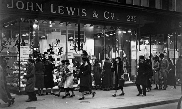 Passers-by outside John Lewis in Oxford Street, London, December 1936.