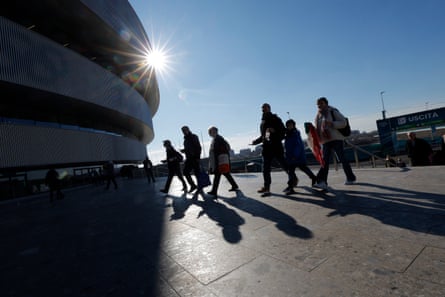 Spectators walking into the venue