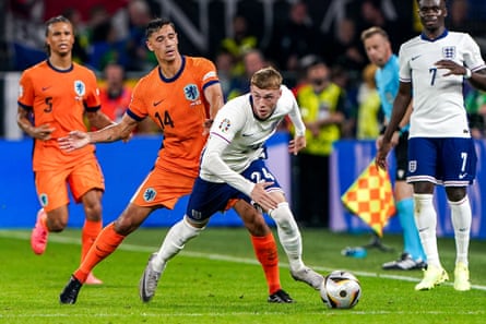 Tijjani Reijnders of the Netherlands battles for possession with Cole Palmer