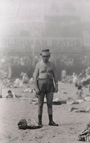 Man in hat, trunks, socks and shoes, Coney Island, NY, 1960