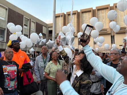 People holding balloons