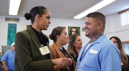 A man and woman shaking hands