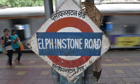 A local train departs from Elphinstone Road railway station in Mumbai.