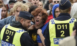 Stockholm police stop protestors during a meeting of the far-right Alternative for Sweden party.