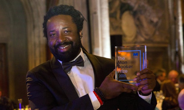 Marlon James poses with his award at the 2015 Man Booker prize ceremony.