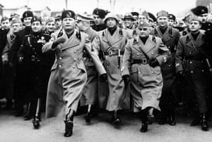 Italian dictator Benito Mussolini (foreground centre) joins in a rehearsal march for a military parade in honour of Hitler’s visit to Rome, January 1938.