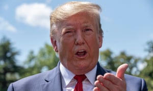 Donald Trump takes questions from reporters as he prepares to depart the South Lawn of the White House in Washington DC Wednesday.