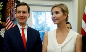 Jared Kushner and Ivanka Trump stand together in the Oval Office of the White House.