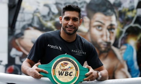Amir Khan shows off the WBC international belt he won by beating Billy Dib in Jeddah