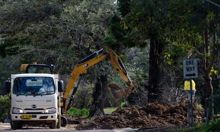 An excavator digs up earth