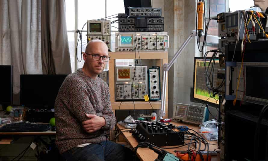 Justin Greenslade, who builds audio equipment for venues, in his studio in north London.