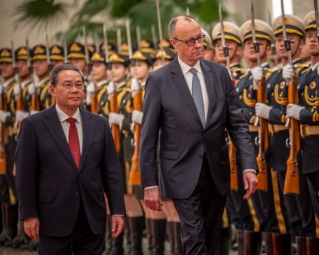Friedrich Merz is welcomed with military honors at the Great Hall of the People by Li Qiang, Premier of China, in Beijing, China.