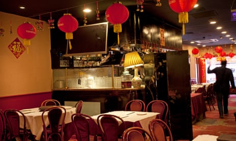 the dining room of Food House with Chinese lamps hanging from the ceiling