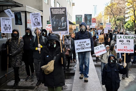 Demonstrators in Buenos Aires, Argentina, at a scientists’ protest against budget cuts reference The Eternaut, 28 May 2025.