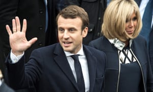 Emmanuel Macron waves to supporters