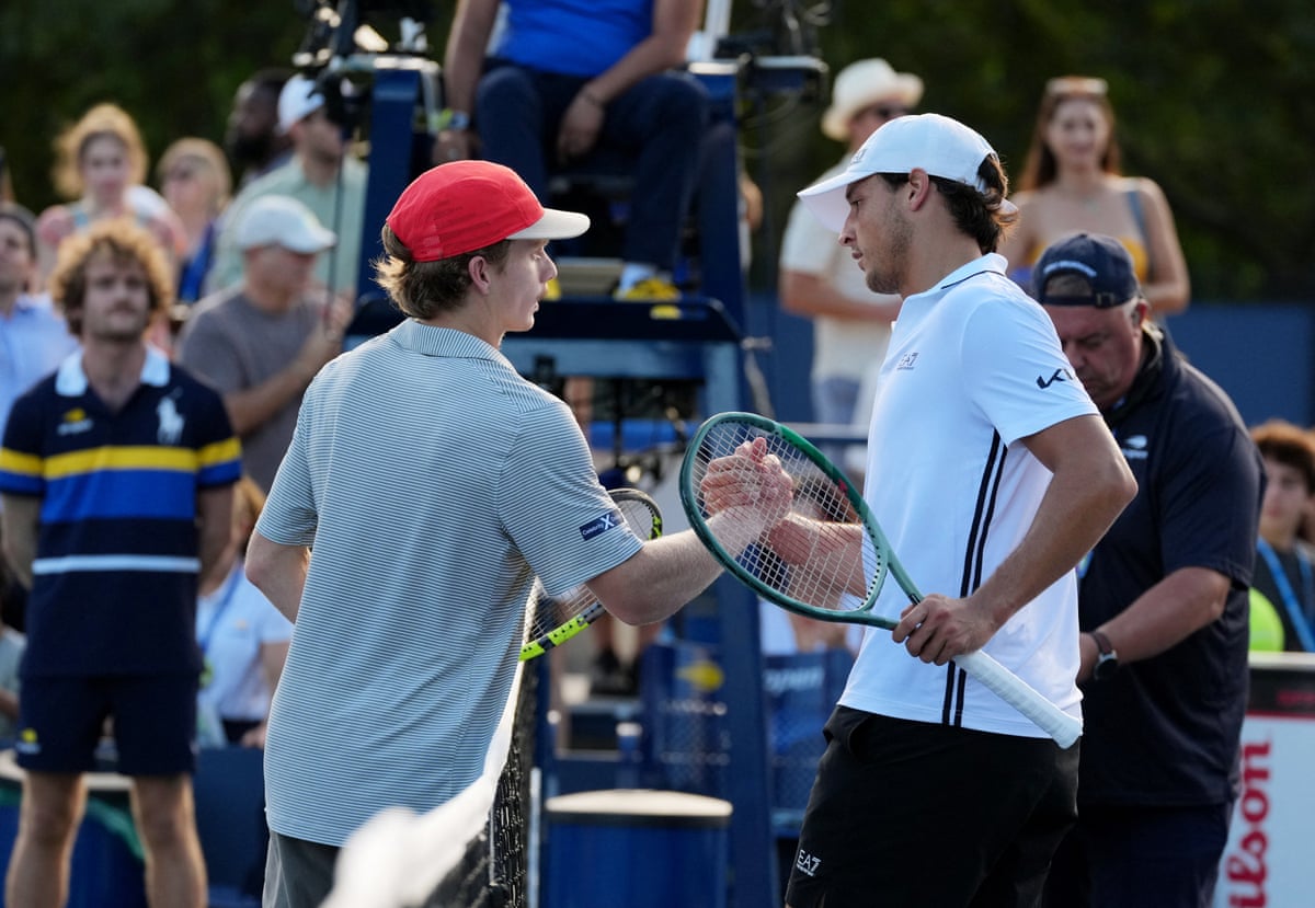 Dane Sweeney and Luciano Darderi shake hands at the net after their third-round match