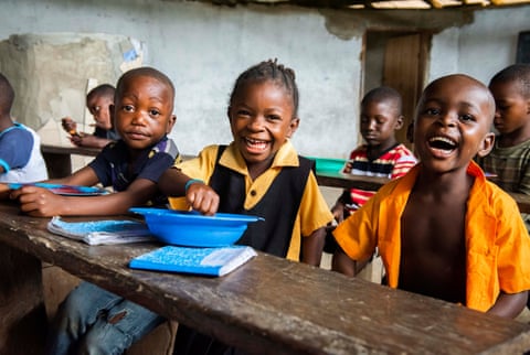 Children eating Mary’s Meals in Liberia