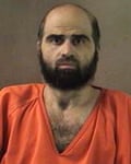 a man in an orange shirt