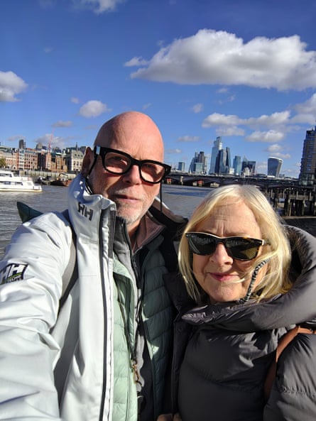 Nick Miller and wife, Carolyn, take a selfie on the Thames with the City in the background