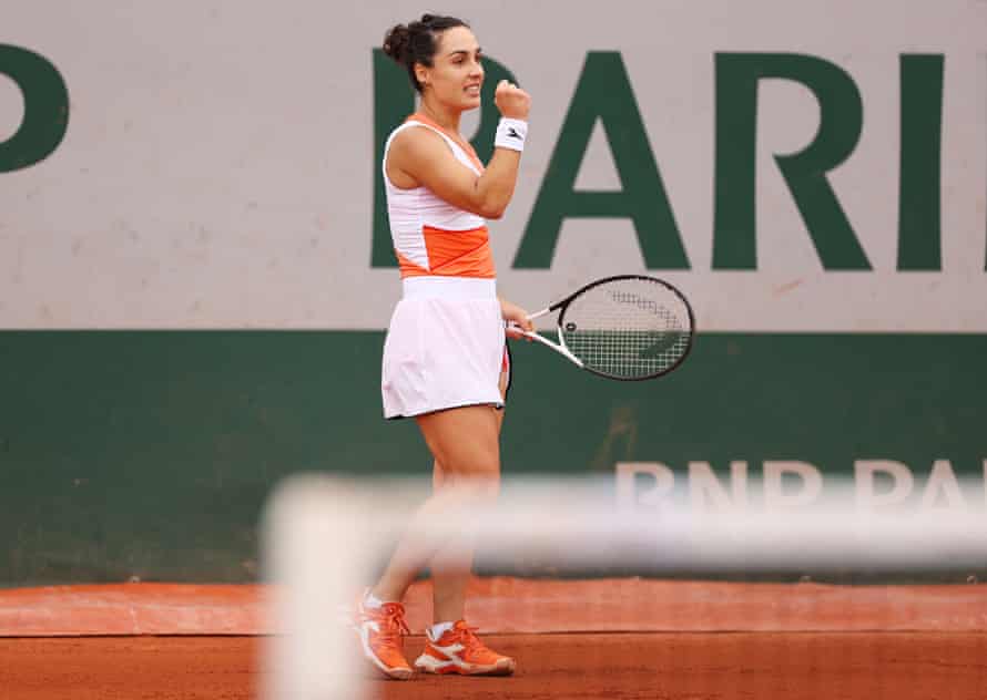 Martina Trevisan celebrates against Harriet Dart.