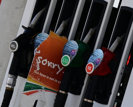 A 7 Eleven Mobile petrol station has signs at the bowser showing sorry they are out of 91 standard unleaded petrol.