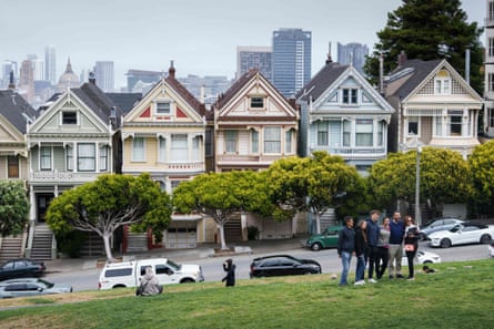 US-POLITICS-RACISM-REPARATIONSTourists enjoy the scene near historic victorian-style homes, some of which were once owned by Black residents, in San Francisco, California on 27 June.