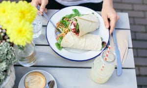 Food, soft drink and coffee photographed from above on a table at the cafe Milk at the Sculpture Workshop in Edinburgh, Scotland, UK.