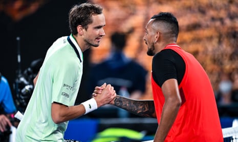 Daniil Medvedev shakes hands with Nick Kyrgios after beating him.