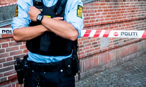 A police officer in Copenhagen. A Danish court has jailed five Swedish men for a double killing committed in Copenhagen. 