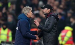 Jurgen Klopp and Manuel Pellegrini exchange words at the final whistle.