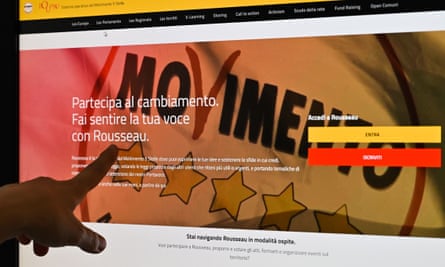 A user points at M5S’s Rousseau website.