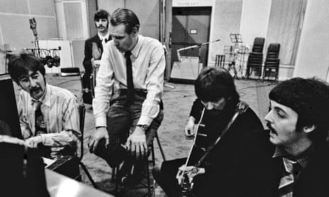 ‘Suave persona’: George Martin with the Beatles at Abbey Road during the Sgt Pepper’s sessions in January 1967.