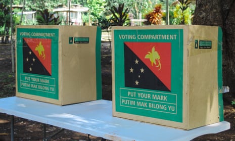 Two voting compartments are set up in a polling area, in Rai Coast, Madang.