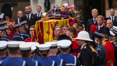 Royal family marches with Queen's coffin to Westminster Abbey – video