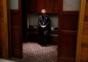 A Roy Moore supporter stands alone at the Republican Senate candidate’s election night party