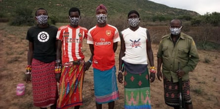 Cattle herders wearing masks provided by Grevy’s Zebra Trust.