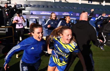Emma Samways and Macey Nicholls of Hashtag United celebrate victory over Newcastle United in the National League Cup final.